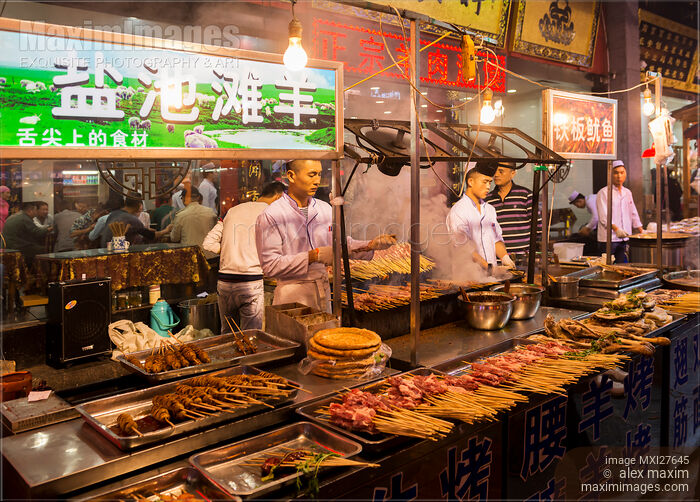 Kebab stand at Muslim food night market in Xian Stock photo of Kebab stand at Muslim food night market in Xian Buy commercial use license at MaximImages