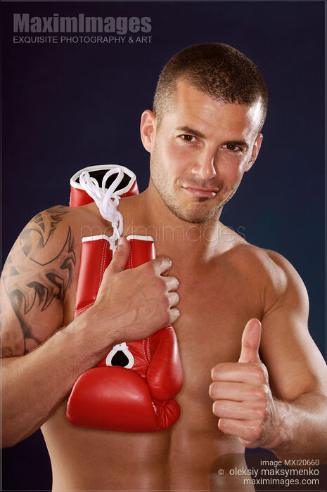 Kickboxer showing thumbs up Stock photo of Kickboxer showing thumbs up Buy commercial use license at MaximImages