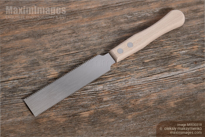 Stock photo of Kugihiki Japanese flush cut double edge hand saw Buy commercial use license at MaximImages
