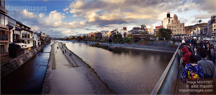 Stock photo of Kyoto Kamo-gawa Kamo River and Shijo bridge panoramic sunset scenery Buy commercial use license at MaximImages