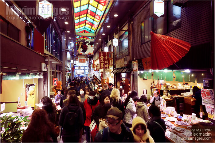 Stock photo of Kyoto Nishiki Food Market historic shopping district busy with people and vendors Buy commercial use license at MaximImages