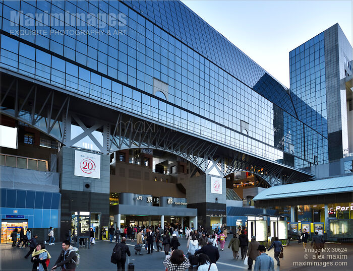 Stock photo of Kyoto Station modern glass building busy with people in the evening Japan 2017 Buy commercial use license at MaximImages