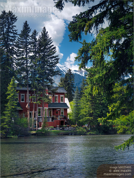 Stock photo of Large waterfront house in Canmore town Alberta's Rockies Buy commercial use license at MaximImages