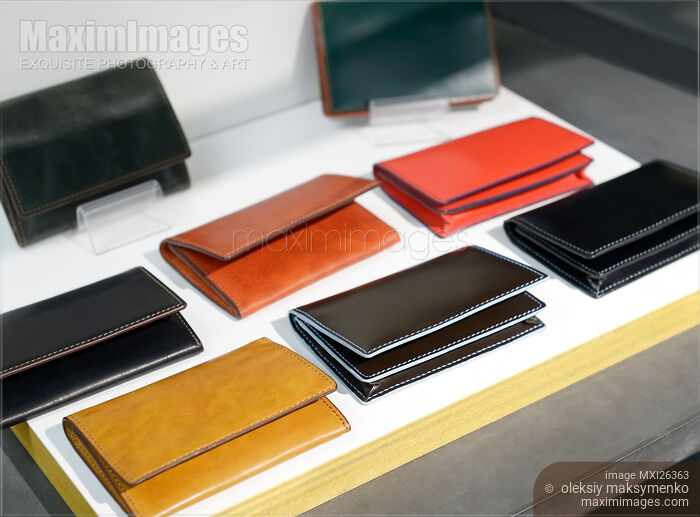 Stock photo of Leather wallets on display in a store Buy commercial use license at MaximImages