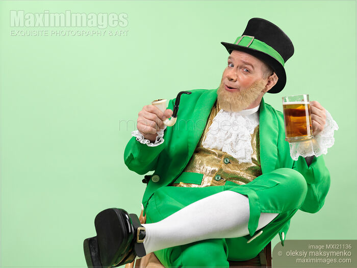 Stock photo of Leprechaun with a Pint of Beer Buy commercial use license at MaximImages
