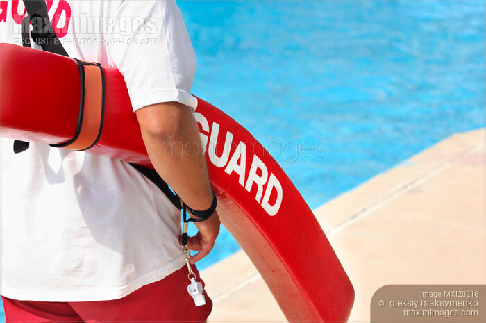 Lifeguard on duty at a pool Stock photo of Lifeguard on duty at a pool Buy commercial use license at MaximImages