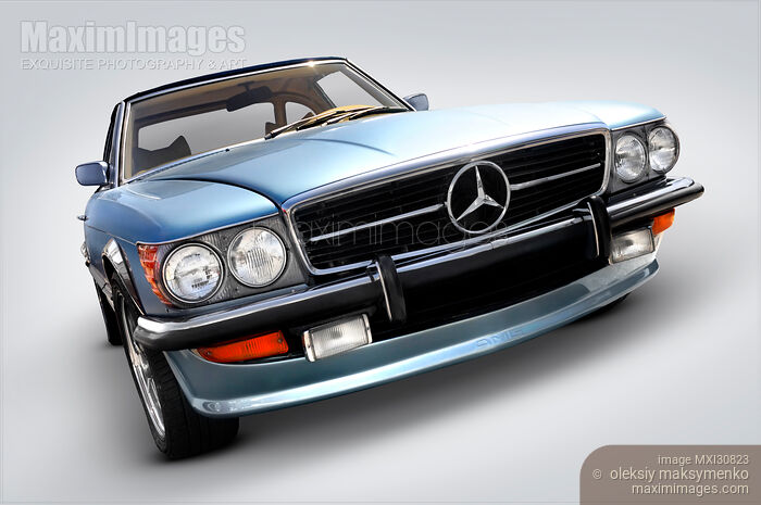 Stock photo of Light Blue Mercedes-Benz 450SL Buy commercial use license at MaximImages