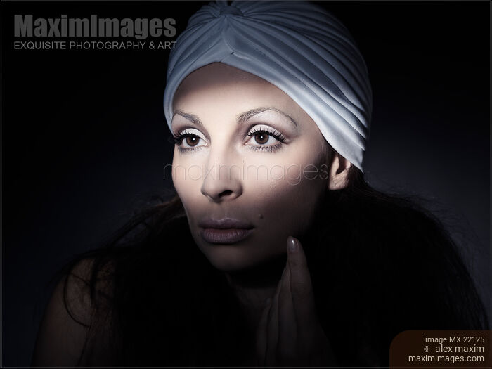 Light Falling on a Beautiful Woman Face Stock photo of Light Falling on a Beautiful Woman Face Buy commercial use license at MaximImages