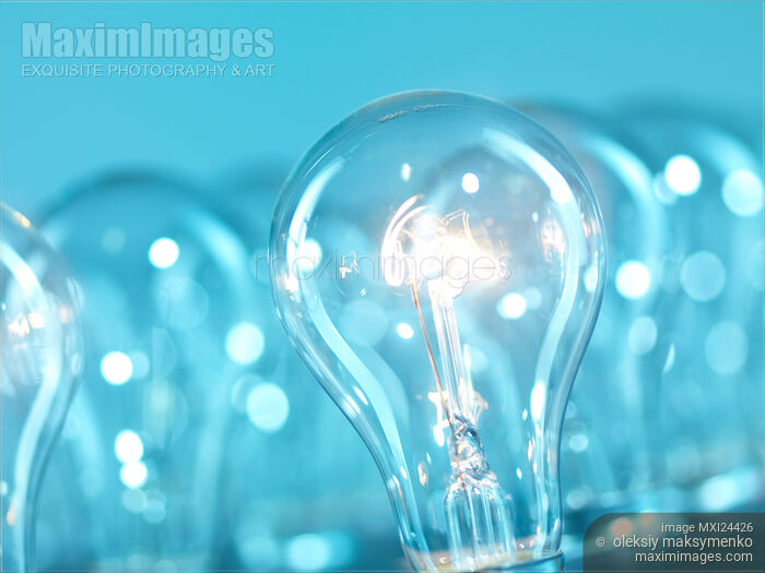 Stock photo of Lit up incandescent light bulb Buy commercial use license at MaximImages