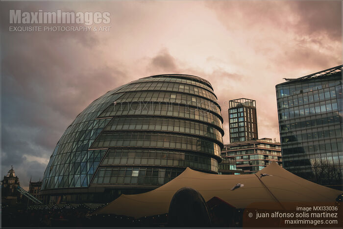 Stock photo of London City Hall building in dramatic sunset city scenery Buy commercial use license at MaximImages