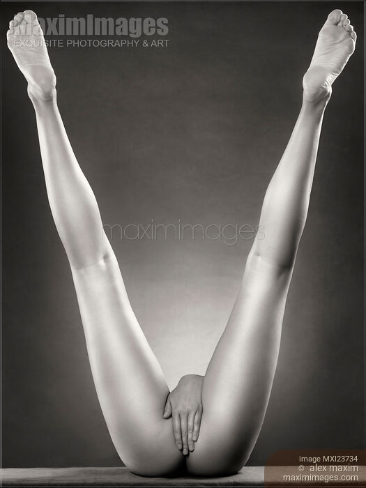 Long Sexy Woman Legs Making V Shape Stock photo of Long Sexy Woman Legs Making V Shape Buy commercial use license at MaximImages