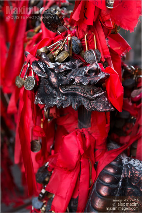 Love locks and red ribbons on bridge at Tianmen mountain China Stock photo of Love locks and red ribbons on bridge at Tianmen mountain China Buy commercial use license at MaximImages