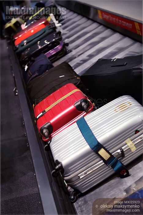 Luggage on airport baggage claim conveyor carousel Stock photo of Luggage on airport baggage claim conveyor carousel Buy commercial use license at MaximImages