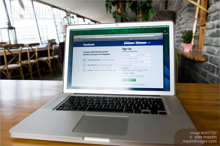 MacBook Apple laptop on a desk with Facebook on display Stock photo of MacBook Apple laptop on a desk with Facebook on display Buy commercial use license at MaximImages
