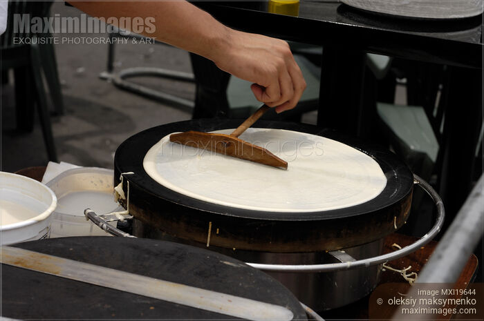 Making Pancakes Stock photo of Making Pancakes Buy commercial use license at MaximImages