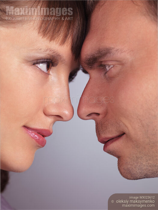 Stock photo of Man and Woman Touching Foreheads Buy commercial use license at MaximImages
