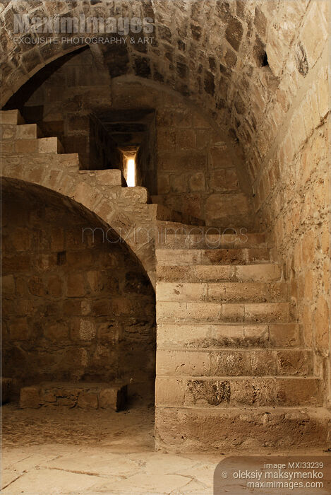Medieval Greek castle dungeon stone interior with staircase Stock photo of Medieval Greek castle dungeon stone interior with staircase Buy commercial use license at MaximImages