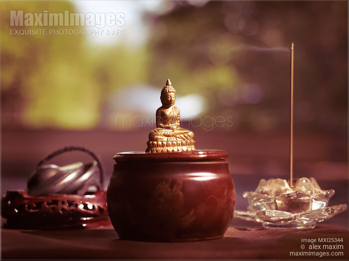 Stock photo of Meditating Buddha Statue Buy commercial use license at MaximImages