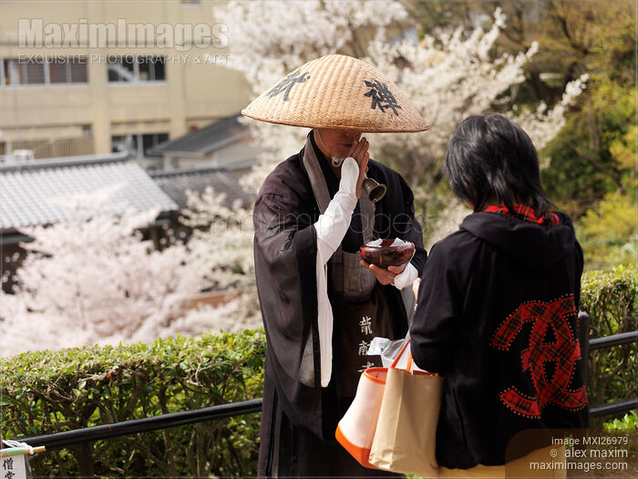 Mendicant Buddhist monk accepting donations Stock photo of Mendicant Buddhist monk accepting donations Buy commercial use license at MaximImages