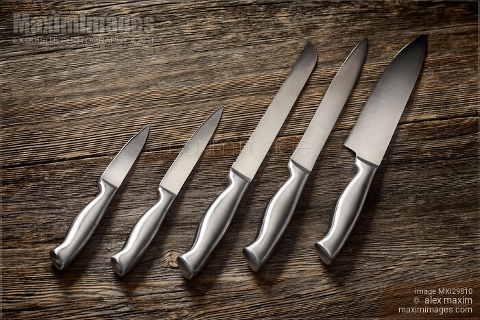 Stock photo of Metal Kitchen Knives Set Buy commercial use license at MaximImages