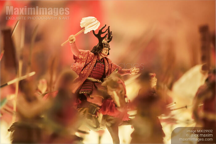 Stock photo of Miniature model of a samurai warrior on horse on battlefield Buy commercial use license at MaximImages