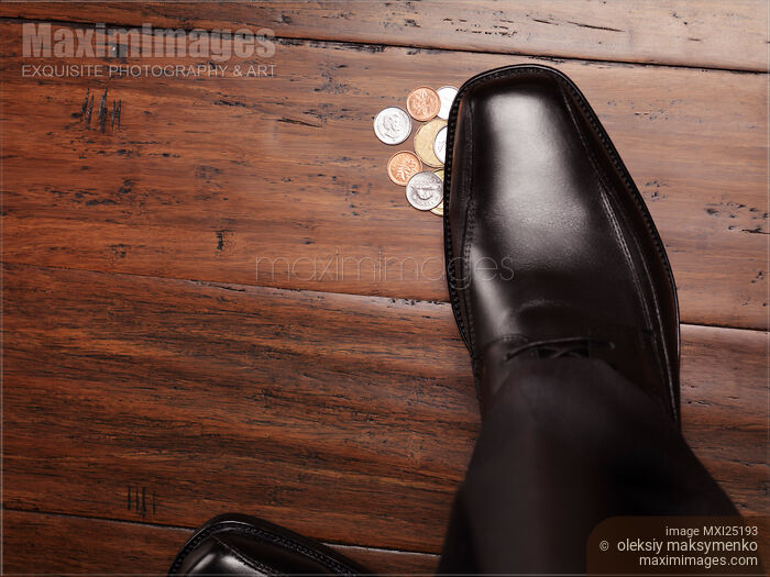 Money found on the floor under shoes Stock photo of Money found on the floor under shoes Buy commercial use license at MaximImages