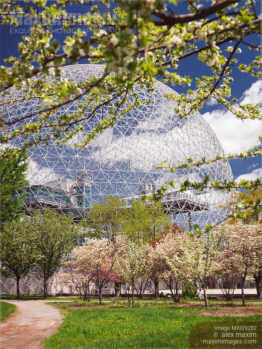 Montréal Biosphere and blossoming fruit trees in springtime Stock photo of Montréal Biosphere and blossoming fruit trees in springtime Buy commercial use license at MaximImages