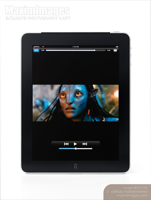 Movie Playing on Apple iPad Stock photo of Movie Playing on Apple iPad Buy commercial use license at MaximImages
