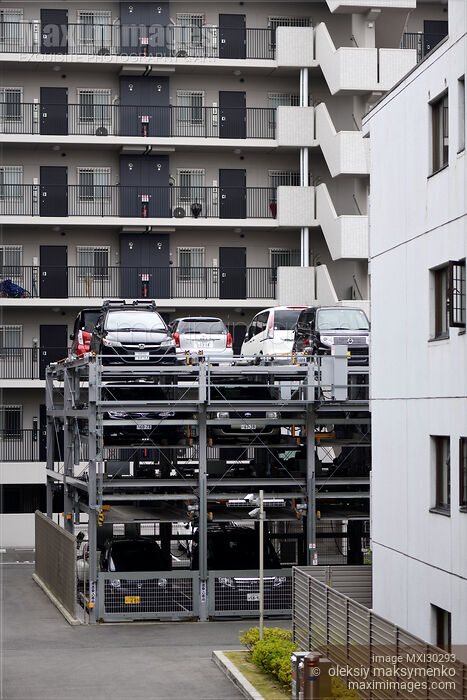 Multi-level vertical three-storey automated parking lot with a lift in Japan Stock photo of Multi-level vertical three-storey automated parking lot with a lift in Japan Buy commercial use license at MaximImages
