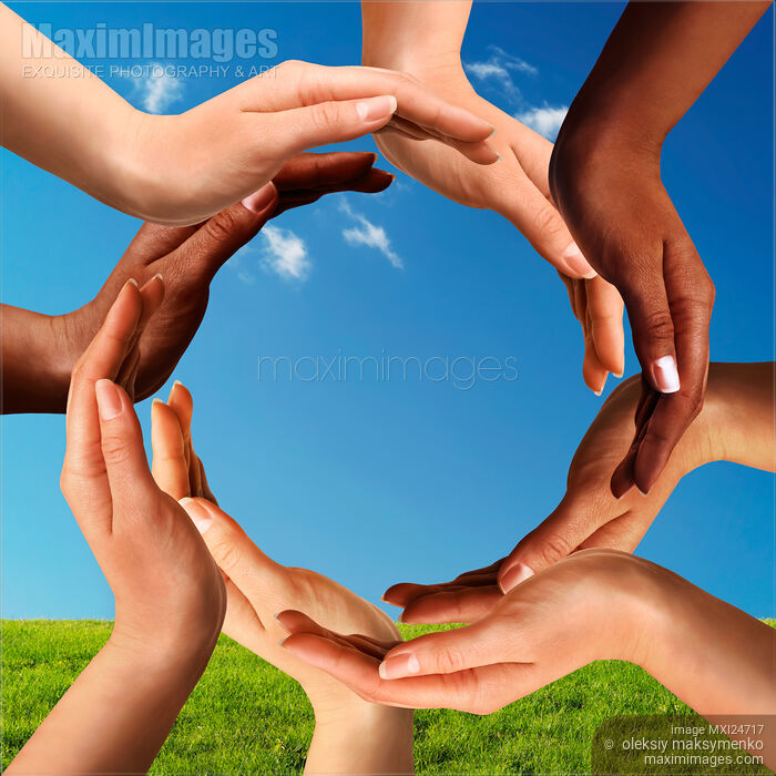 Stock photo of Multiracial Hands Making a Circle Together Buy commercial use license at MaximImages