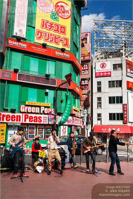 Music band on the streets of Shinjuku Tokyo Stock photo of Music band on the streets of Shinjuku Tokyo Buy commercial use license at MaximImages