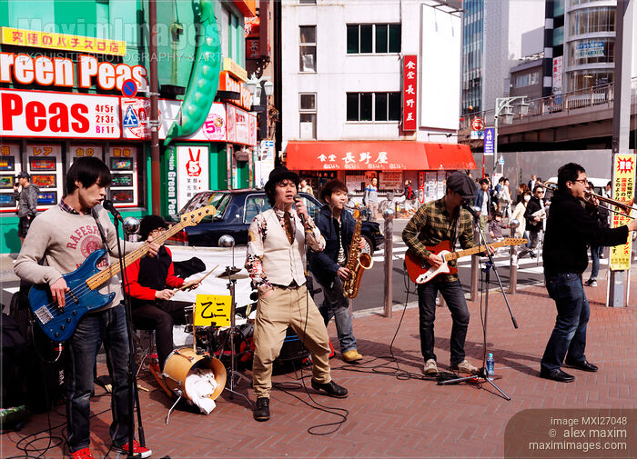 Stock photo of Music band playing on the streets of Shinjuku Tokyo Buy commercial use license at MaximImages
