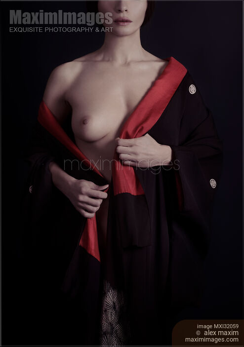Mysterious woman with white skin taking off black and red kimono revealing her bare breast Stock photo of Mysterious woman with white skin taking off black and red kimono revealing her bare breast Buy commercial use license at MaximImages