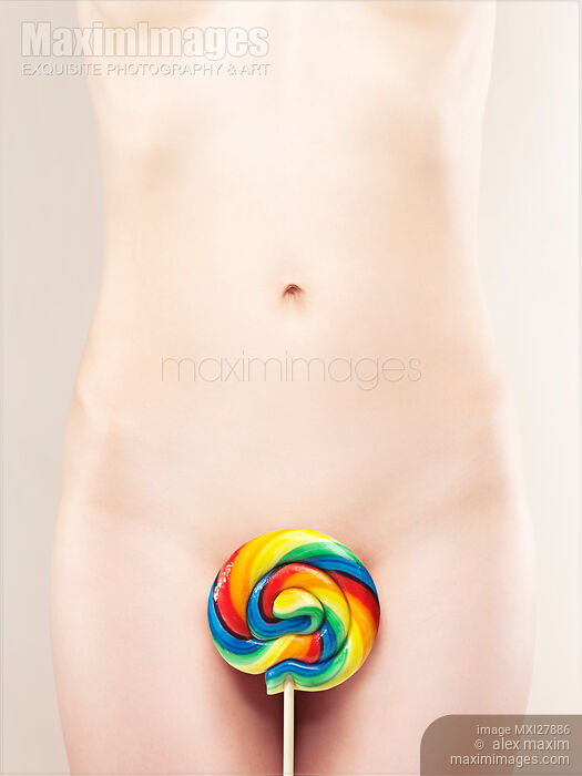 Stock photo of Naked Woman with a Colorful Lollipop Buy commercial use license at MaximImages