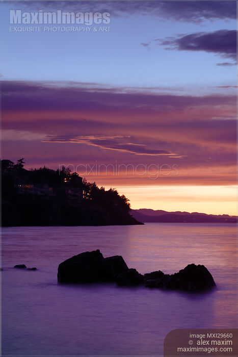 Stock photo of Nanaimo BC pink sunset surreal scenery of the ocean coast on Vancouver Island Buy commercial use license at MaximImages