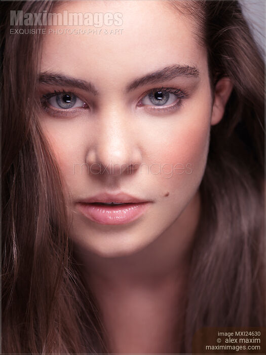 Natural look beauty portrait of young woman Stock photo of Natural look beauty portrait of young woman Buy commercial use license at MaximImages