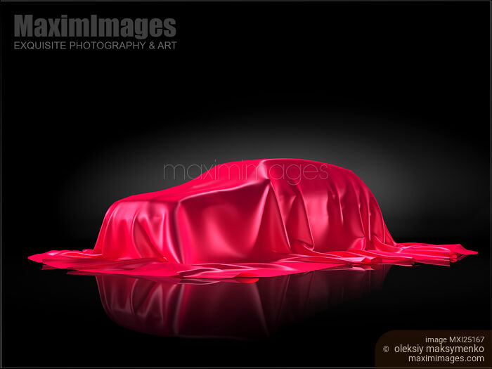 New car model under red covering Stock image of New car model under red covering Buy commercial use license at MaximImages