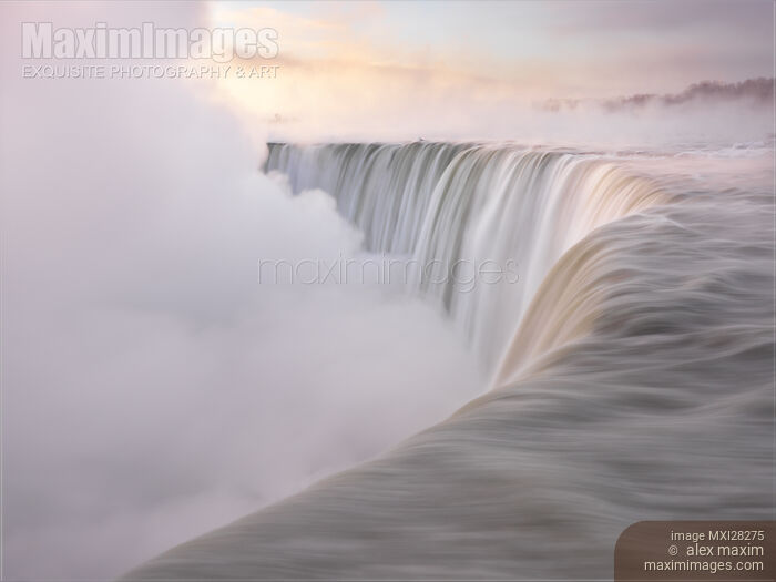 Niagara Falls beautiful sunrise in soft light colors Stock photo of Niagara Falls beautiful sunrise in soft light colors Buy commercial use license at MaximImages