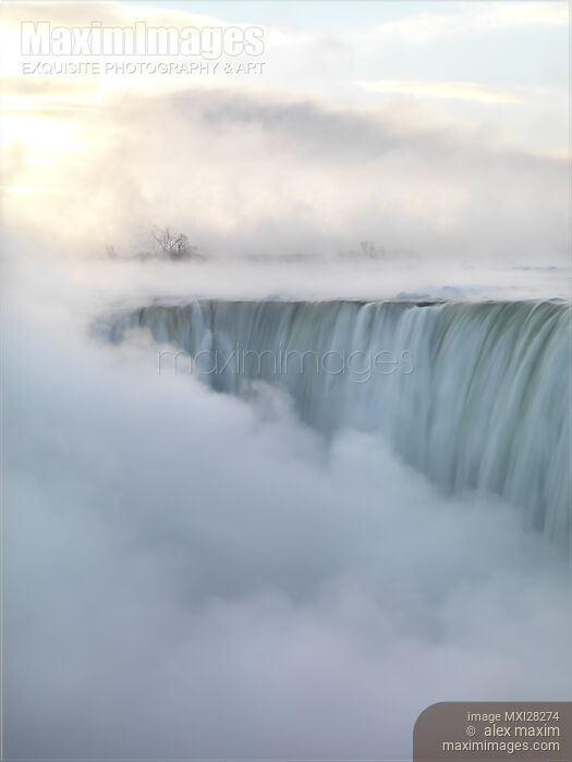 Niagara Falls covered in mist beautiful sunrise scenery Stock photo of Niagara Falls covered in mist beautiful sunrise scenery Buy commercial use license at MaximImages