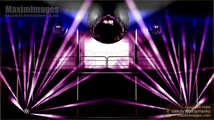 Stock image of Night club colorful lights and disco balls Buy commercial use license at MaximImages