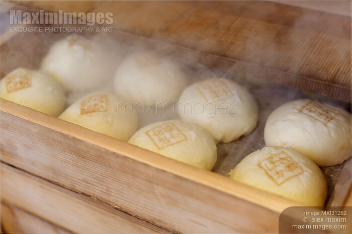 Nikuman Japanese steamed pork buns in a steamer of street shop Stock photo of Nikuman Japanese steamed pork buns in a steamer of street shop Buy commercial use license at MaximImages