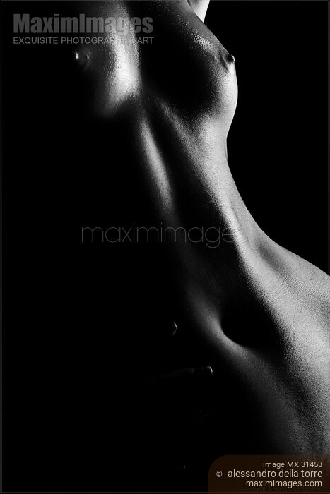 Stock photo of Nude woman body close-up of stomach waist and breasts curves Buy commercial use license at MaximImages