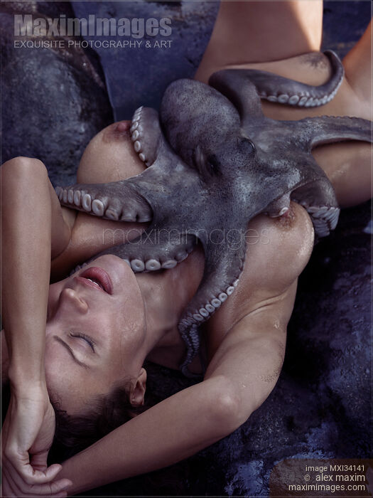 Nude woman lying on sea shore in passionate embrace of octopus tentacles caressing her naked sensual body Stock photo of Nude woman lying on sea shore in passionate embrace of octopus tentacles caressing her naked sensual body Buy commercial use license at MaximImages