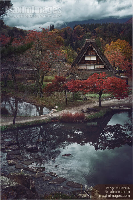 Old Japanese rural Gassho house in a peaceful autumn scenery with a pond and colorful trees Shirakawa-go village Stock photo of Old Japanese rural Gassho house in a peaceful autumn scenery with a pond and colorful trees Shirakawa-go village Buy commercial use license at MaximImages