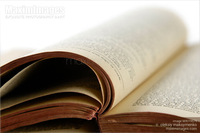 Stock photo of Old Open Tattered Book Buy commercial use license at MaximImages