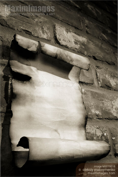 Stock photo of Old Parchment on a Brick Wall Buy commercial use license at MaximImages