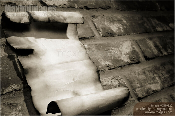 Stock photo of Old Parchment on a Brick Wall Buy commercial use license at MaximImages