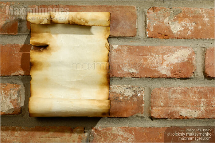 Stock photo of Old Parchment on a Brick Wall Buy commercial use license at MaximImages