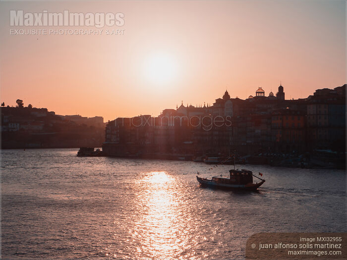 Old town Ribeira city skyline in Porto Portugal during sunset Douro river Stock photo of Old town Ribeira city skyline in Porto Portugal during sunset Douro river Buy commercial use license at MaximImages