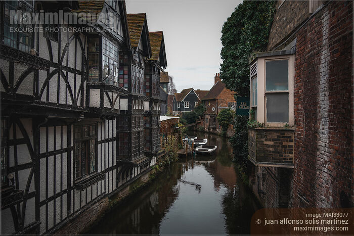 Stock photo of Old Weavers house and other historic buildings along the River Stour in Canterbury England UK Buy commercial use license at MaximImages